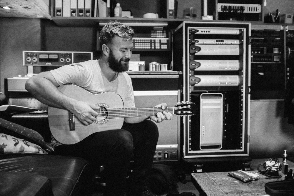 In the studio with guitar