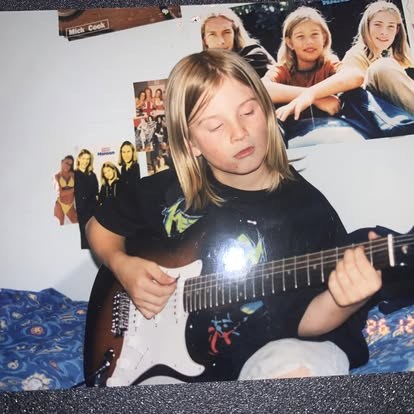 Young Brenty with his first electric guitar